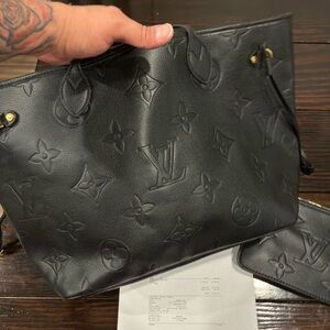 Like-new Louis Vuitton Neverfull MM – Black Monogram Empreinte Leather (M45685).